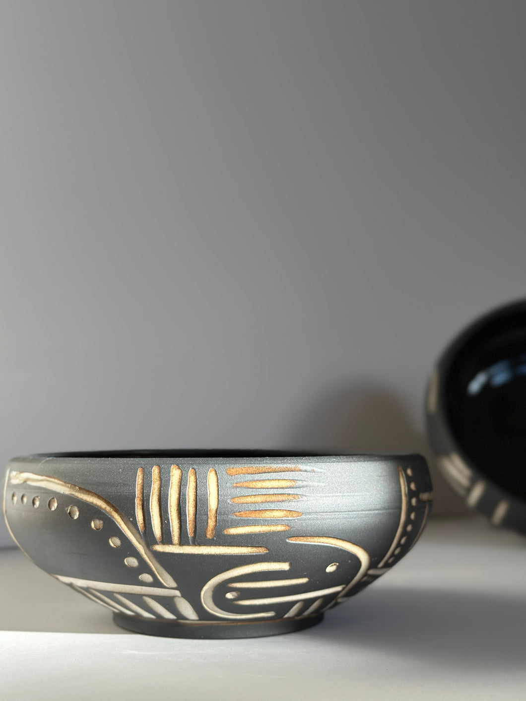 Carved obsidian bowl