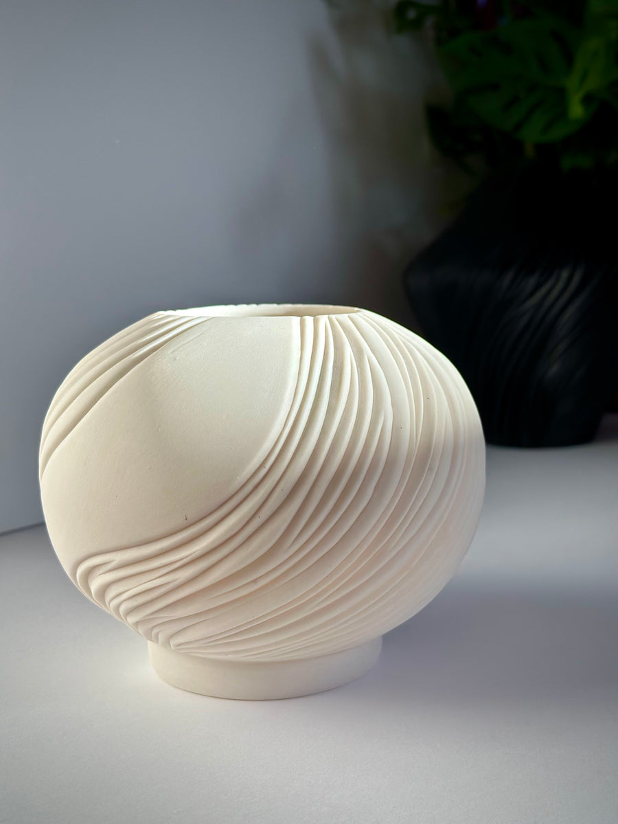 Carved porcelain luminary