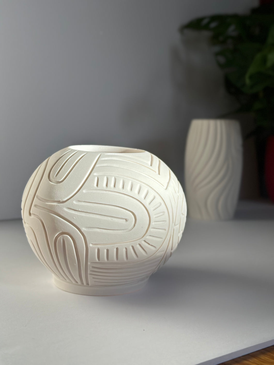 Carved porcelain luminary